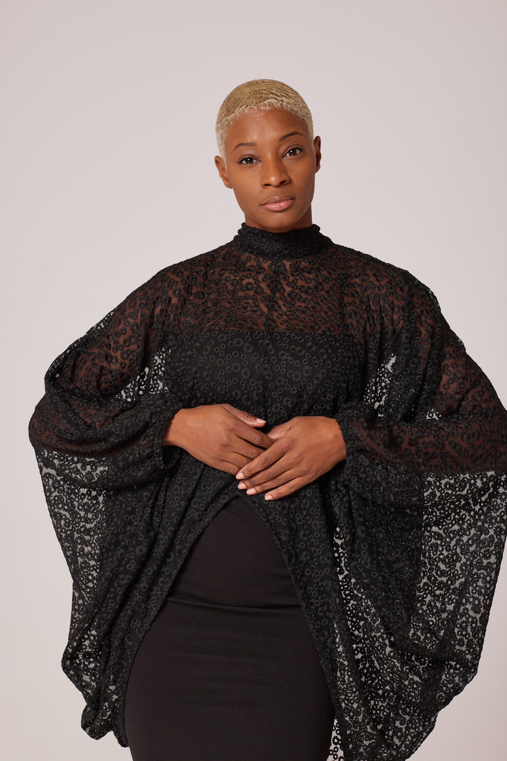 NoirLaceWhisper, EbonyEleganceTunic, ObsidianChantillyChic, OnyxIntrigueTunic, MidnightLaceSerenity, JetBlackEtherealDrape, NoirEnigmaTunic, LaceNocturneElegance, EbonyLuxeLaceTunic, OnyxSilhouetteSweep,
