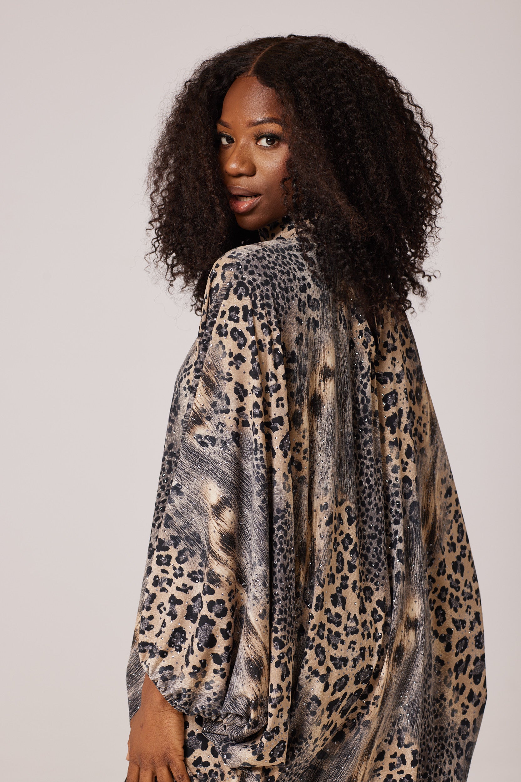SparklingSafariChic, GlitteredLeopardLuxury, ShimmeringFelineEssence, DazzlingCheetahElegance, LustrousLeopardDrape, TwinklingWildGlam, RadiantJungleCouture, GlimmeringLeopardStyle, GleamingCheetahTunic, GlamorousSpotsEnsemble,