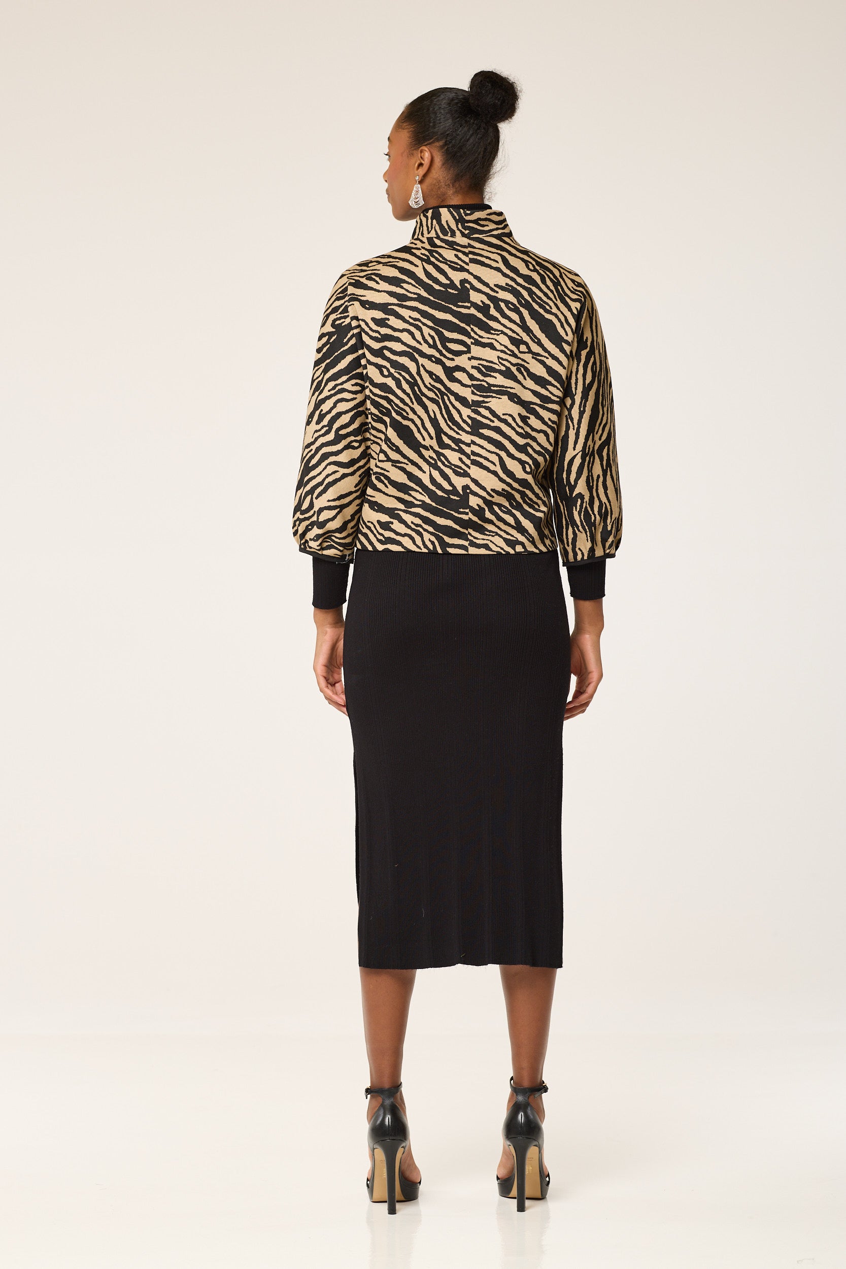 SaharaStripeElegance, NomadZebraChic, TawnyTwilightJacket, SandySafariStyle, SunlitZebraGlam, DesertDawnJacke, ZephyrStripeCouture, CamelCanvasZebra, SandyTwilightOuterwear,