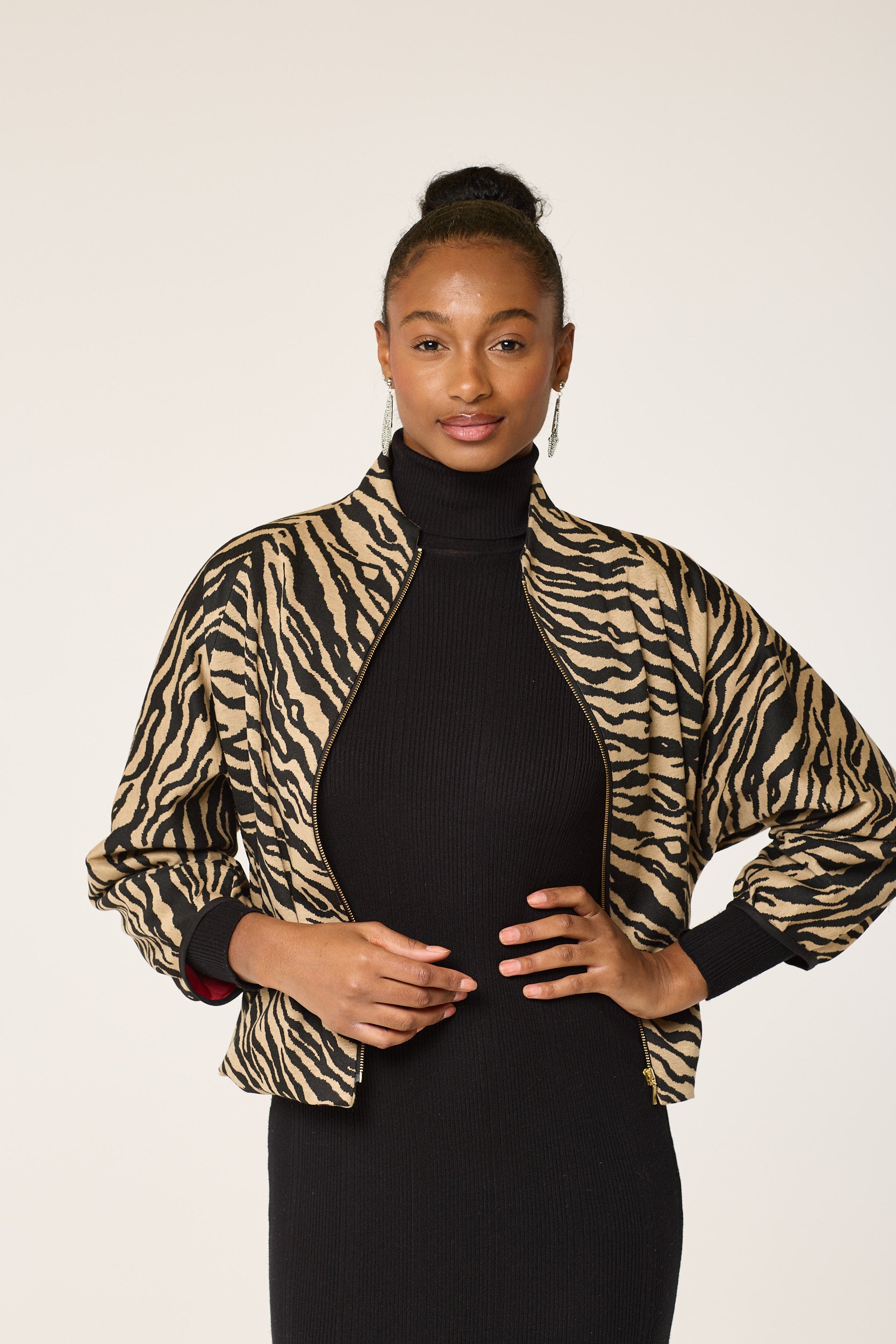 SaharaStripeElegance, NomadZebraChic, TawnyTwilightJacket, SandySafariStyle, SunlitZebraGlam, DesertDawnJacke, ZephyrStripeCouture, CamelCanvasZebra, SandyTwilightOuterwear,